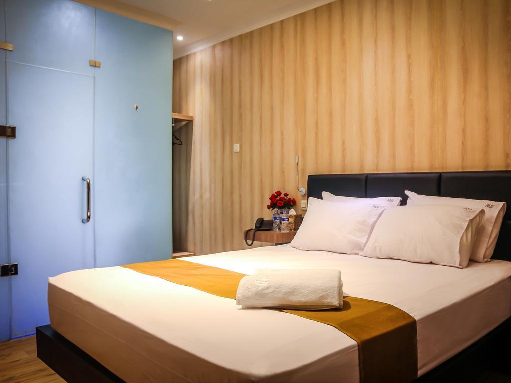 Madu Inn Jakarta Værelse billede