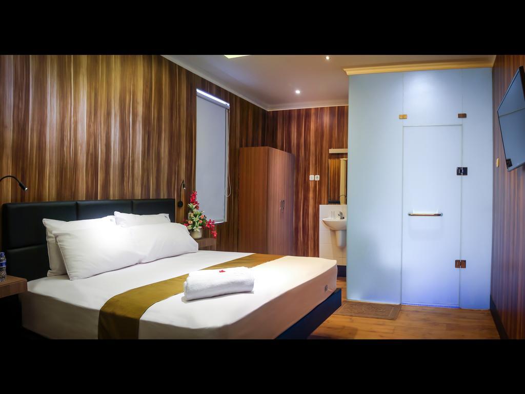 Madu Inn Jakarta Værelse billede