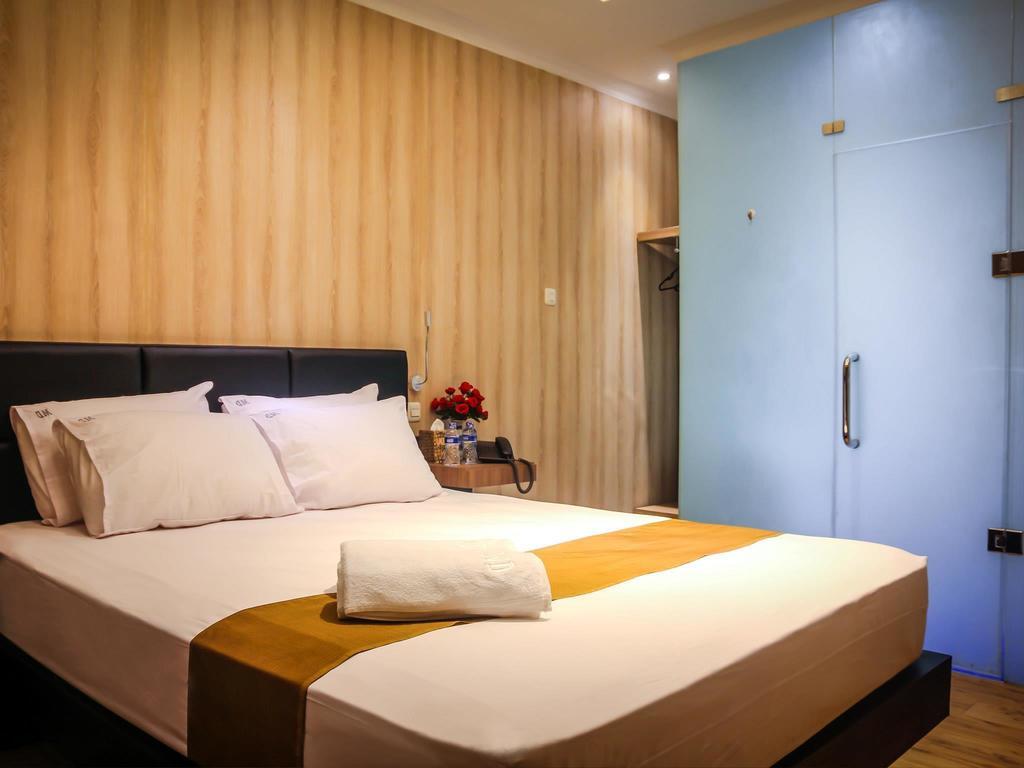 Madu Inn Jakarta Værelse billede